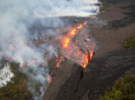 Lava poured from a new vent that opened on Kilauea volcano over the weekend after the floor at the Pu’u O’o crater collapsed.