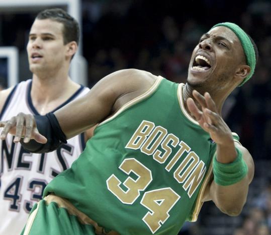 Paul Pierce appears pained as he watches his 3-pointer clang off the rim. Pierce connected on just 2 of 10 field goals.
