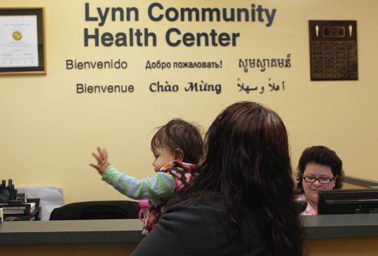 Carmen Landaverde and her daughter, Jocelyn, at the Lynn Community Health Center, where an expansion is underway.