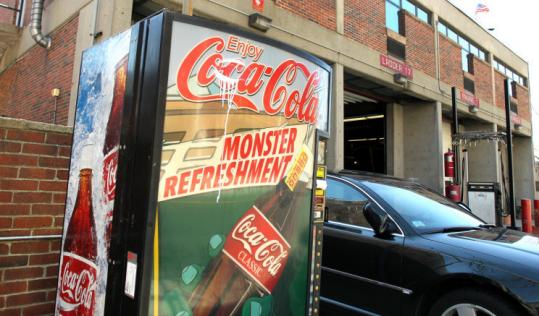 A Coca-Cola machine in front of the Boston Fire Department’s station on Columbus Avenue in the South End.
