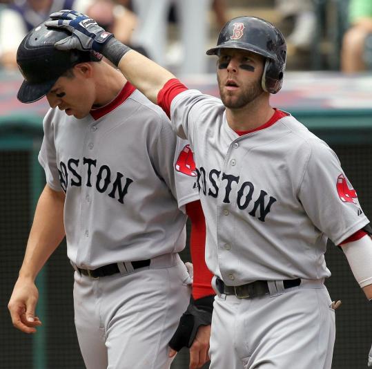 Dustin Pedroia gave Jacoby Ellsbury a hand after Pedroia’s home run in the first inning.