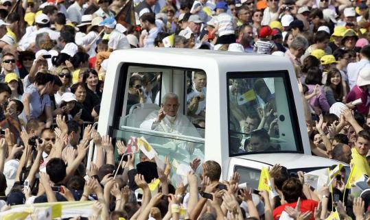 Pope Benedict XVI waved as he arrived to lead a Mass in Zagreb, Croatia. About 400,000 people attended during the local church’s national day of families.