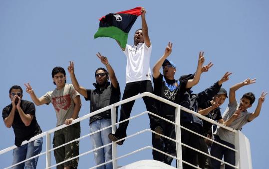 One of the freed Libyan rebels aboard a Red Cross ship yesterday said security forces “broke my ribs, hand, and leg.’’