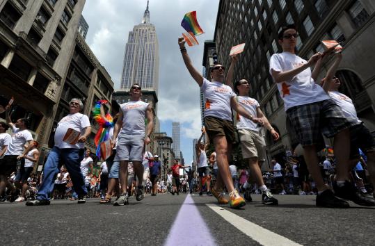The annual New York City Pride Parade, show here on Fifth Avenue, had even greater meaning yesterday because of the state Legislature’s legalization of same-sex marriage two days before.