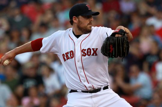 Starter John Lackey benefited from the Sox’ offensive outburst to post his fourth straight win.