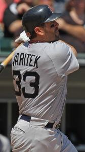 Jason Varitek connects for a two-run homer in the second inning against the White Sox.