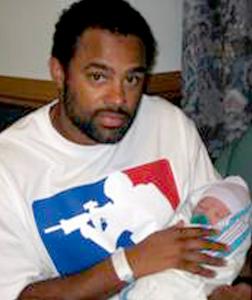 Friends said Kevin Houston, holding his son Ethan, always wanted to be a Navy SEAL.