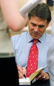 perry s critique of romney health law has practical focus by matt ...