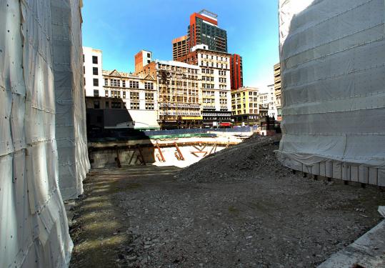 The former Filene’s property in Downtown Crossing has been quiet since work was halted in 2008, sparking the mayor’s fury.