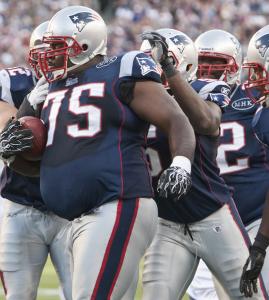 Vince Wilfork of the Patriots celebrates after his first career interception.