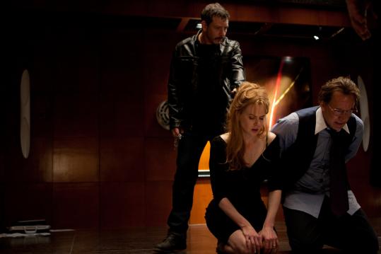 Ben Mendelsohn (left) plays a thug and Nicole Kidman and Nicolas Cage are a wealthy couple in Joel Schumacher’s “Trespass.’’