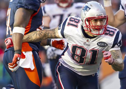 Aaron Hernandez had a career day with nine catches for 129 yards and a TD.