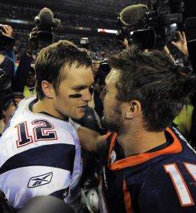 Quarterbacks Tom Brady of the Patriots and Tim Tebow of the Broncos meet at midfield following their game in Denver.