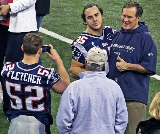 Bill Belichick was all smiles as he posed with Ross Ventrone for a picture snapped by Dane Fletcher.