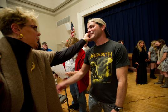 Judy DeWitt of Holliston greets Adam Green at Holliston Town Hall after a screening of two episodes from his upcoming comedy-horror TV series.
