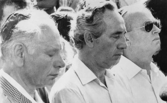 From left, Ben-Zion Netanyahu, Defense Minister Shimon Peres, and Prime Minister Yitzhak Rabin at the funeral of Jonathan Netanyahu, who was killed rescuing Israeli hostages.