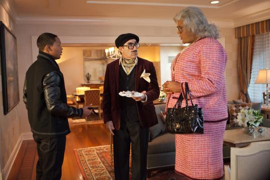 Tyler Perry (right) with Romeo Miller (left) and Eugene Levy in “Madea’s Witness Protection.’’