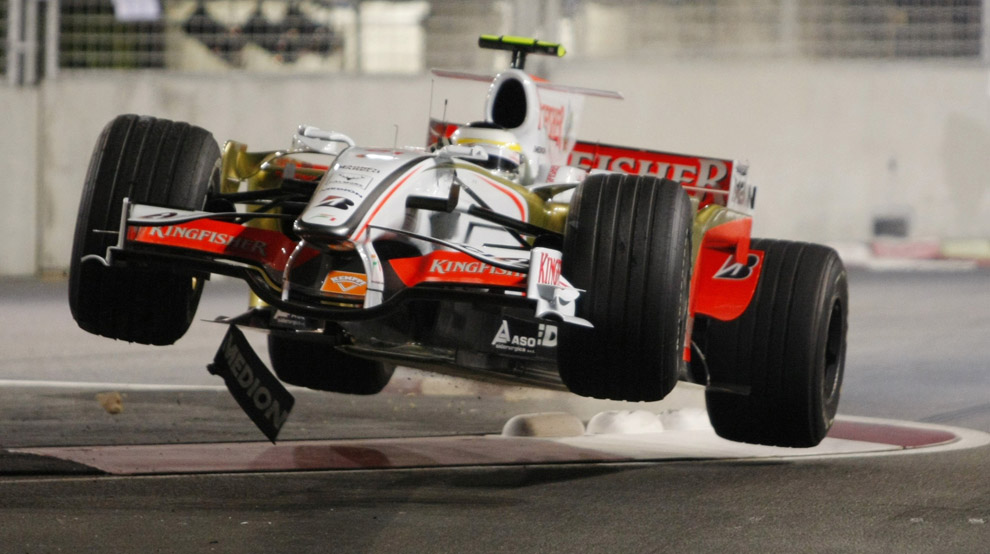Force India Formula One driver Giancarlo Fisichella of Italy flies through