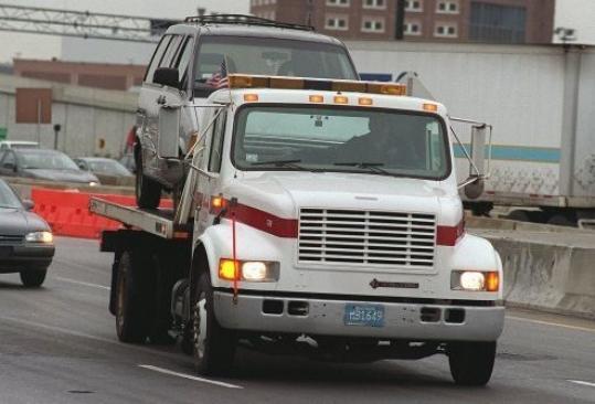 Towing for safety has its costs - The Boston Globe